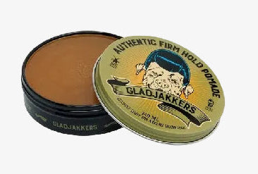 Pomadeblik met open deksel; bruine pomade zichtbaar in het blik.
