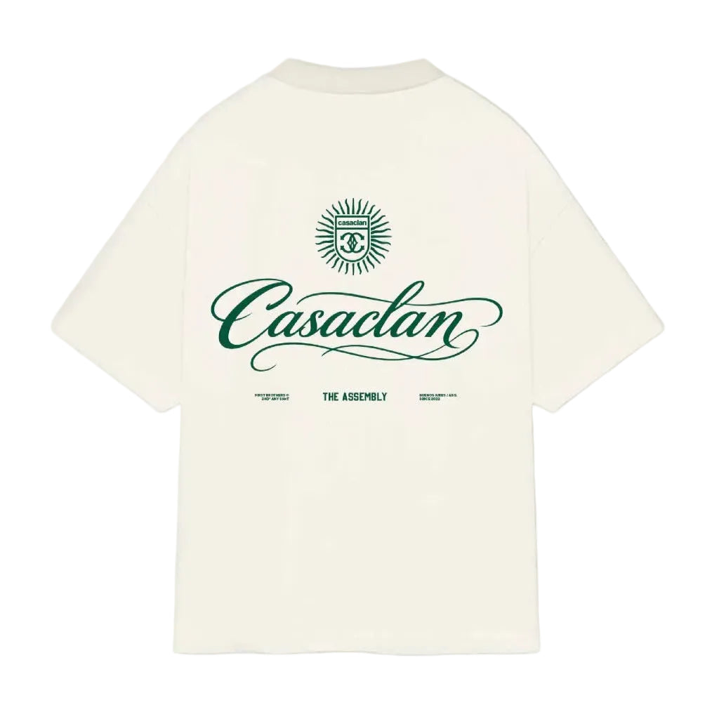 Lichtbeige T-shirt met ronde hals en grote rugprint met turquoise logo