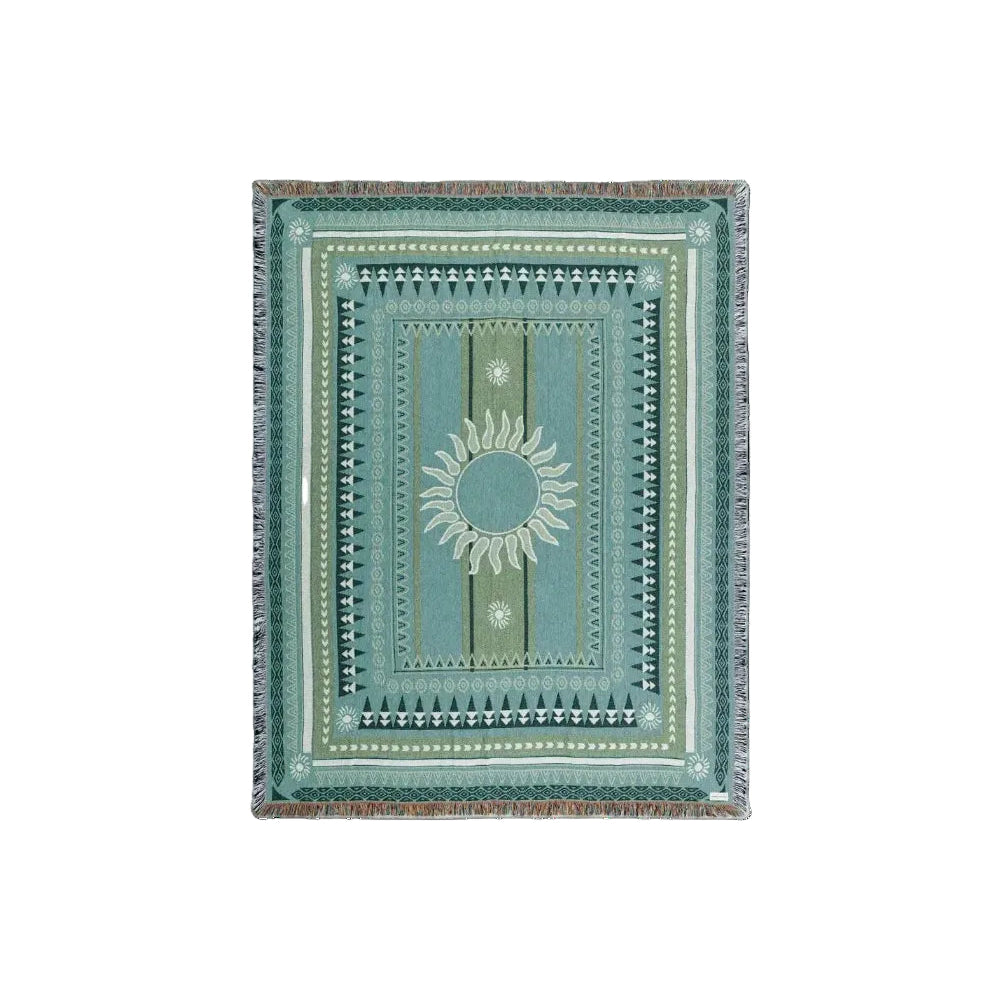 Groen-teal dekentje met zonmotief en sierlijke rechthoekige rand